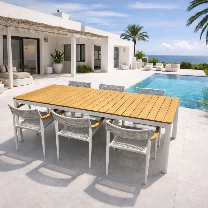 Bonita tuintafel met 6 coco stapelstoelen in wit alluminium