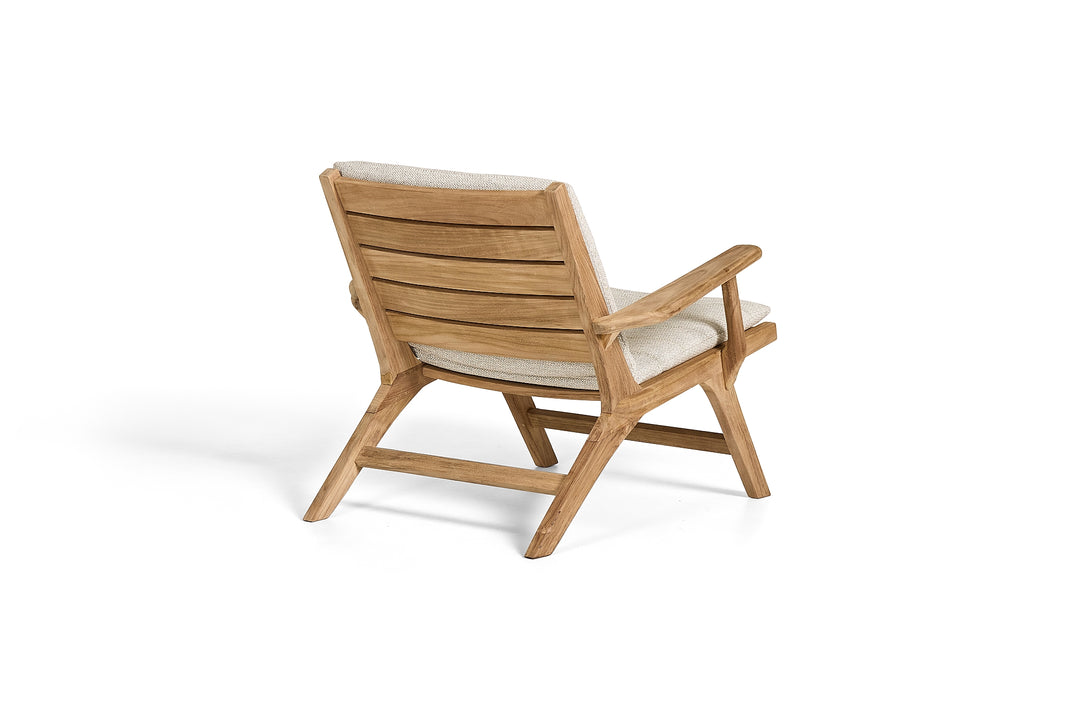 Koozy lounge chair in teak with armrests